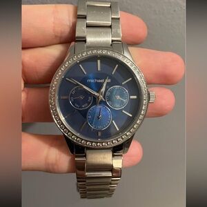 Michael Hill watch. Silver band with blue face.
